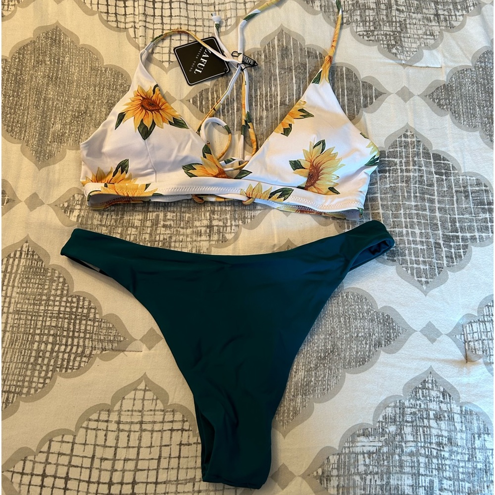 New with tags two piece bathing suit size large.